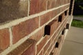 Red bricks close, angled perspective with leading lines