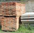 Red bricks and concrete slabs stacked together Royalty Free Stock Photo