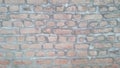 Red bricks and concrete wall