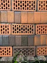 Red bricks with holes background. Storage brickwork product Royalty Free Stock Photo