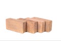 Red bricks are isolated on white background. Clay bricks are used for construction.