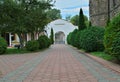 Red bricks sidewalk leading to gate in Serbian monastery Royalty Free Stock Photo