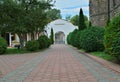 Red bricks sidewalk leading to gate in Serbian monastery