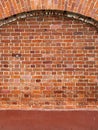 Red brickwork arched wall. Texture brick, background Royalty Free Stock Photo