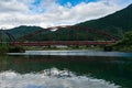 Red bridge across Kiso river, Japan Royalty Free Stock Photo