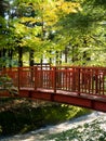 Red bridge across the Togawa river in Shimosuwa - Nagano prefecture, Japan Royalty Free Stock Photo