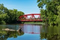 Red Bridge in bright daylight over the Wallkill River.