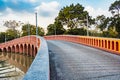 Red bridge in Chatuchak Park Bangkok Thailand