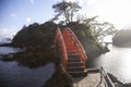 Red bridge conecting volcanic rock formations in Sado Island in Yajima and Kyojima.