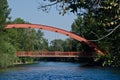 Red Bridge Extending Over the River