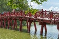 Red Bridge- The Huc Bridge in Hoan Kiem Lake, Hanoi, Vietnam Royalty Free Stock Photo