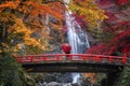 The red bridge in minoh waterfall Royalty Free Stock Photo