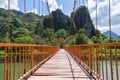 Red bridge over song river Royalty Free Stock Photo