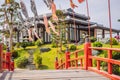 A red bridge over water in a Japanese garden Royalty Free Stock Photo