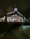 The Red Bridge and the Trade House `At the Red Bridge` with a beautiful dome on the Moika embankment in St. Petersburg, decorate