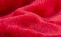 Red bright artificial fur, Faux fur background. Royalty Free Stock Photo