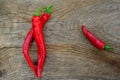 Red hot chili peppers on a wooden background close-up. Royalty Free Stock Photo