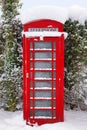 Red British phonebox in the snow