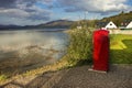 British telephone box on the shore of Kentallen. Loch Linnhe, Argyll and Bute, Highlands, Scotland, UK Royalty Free Stock Photo