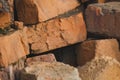 Broken bricks dumped into a pile for construction