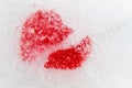 Red broken heart frozen in ice Valentine`s Day