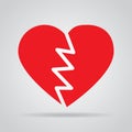 Red broken heart icon with shadow on a gray background