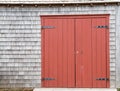 Red Brown Barn Doors to old farm structure Royalty Free Stock Photo