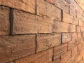 Red brown brick with different aspect of geometry , rough texture of wall building