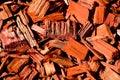 Red, brown and orange wood chip mulch with split wood texture Royalty Free Stock Photo