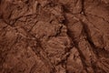 Red brown rock texture. Cracked layered mountain surface. Close-up. Grungy stone background Royalty Free Stock Photo
