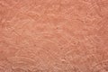 Red-brown rough plaster wall texture