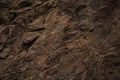 Red brown stone background. Rock surface. Mountain texture. Close-up.