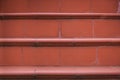 Red brown tiles steps stairs shooted in front view with selective focus