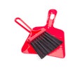 Red brush and plastic dustpan. Royalty Free Stock Photo