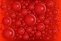 Red bubbles on same color gradient background. Blood molecules or abstract round particles. Medical or biological concept pattern