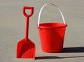 Red bucket and spade Royalty Free Stock Photo