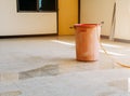 Red bucket underlie water leak interior office building in from Ceiling Royalty Free Stock Photo