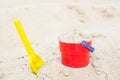 Red bucket and yellow spade Royalty Free Stock Photo