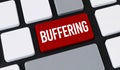 Red buffering button on computer keyboard. Concept of slow video streaming, internet lag and system loading Royalty Free Stock Photo