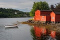 Red building and dinghy