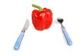Red bulgarian pepper with knife and fork Royalty Free Stock Photo