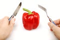 Red bulgarian pepper knife and fork Royalty Free Stock Photo