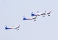 Red Bull display aerobatic team taking off at Aero India Show 2013.