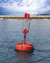 Red buoy in the sea Royalty Free Stock Photo