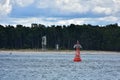 Red buoy in shipping channel Royalty Free Stock Photo