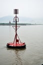 Red buoy with solar panel Royalty Free Stock Photo