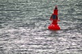 Red buoy with solar panel Royalty Free Stock Photo