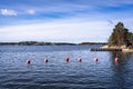 Red buoys float on the water. Panoramic view of the Baltic Sea Bay on sunny spring day.