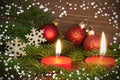 Red Burning Candles with Christmas Decoration Royalty Free Stock Photo