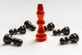 Red burning King and many fallen pawns - chess concept Royalty Free Stock Photo